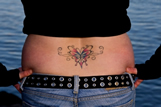 Girl with tattoo on back
