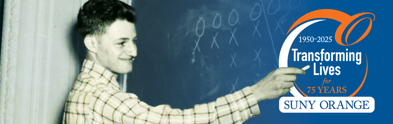 student in 1951 writing on chalkboard